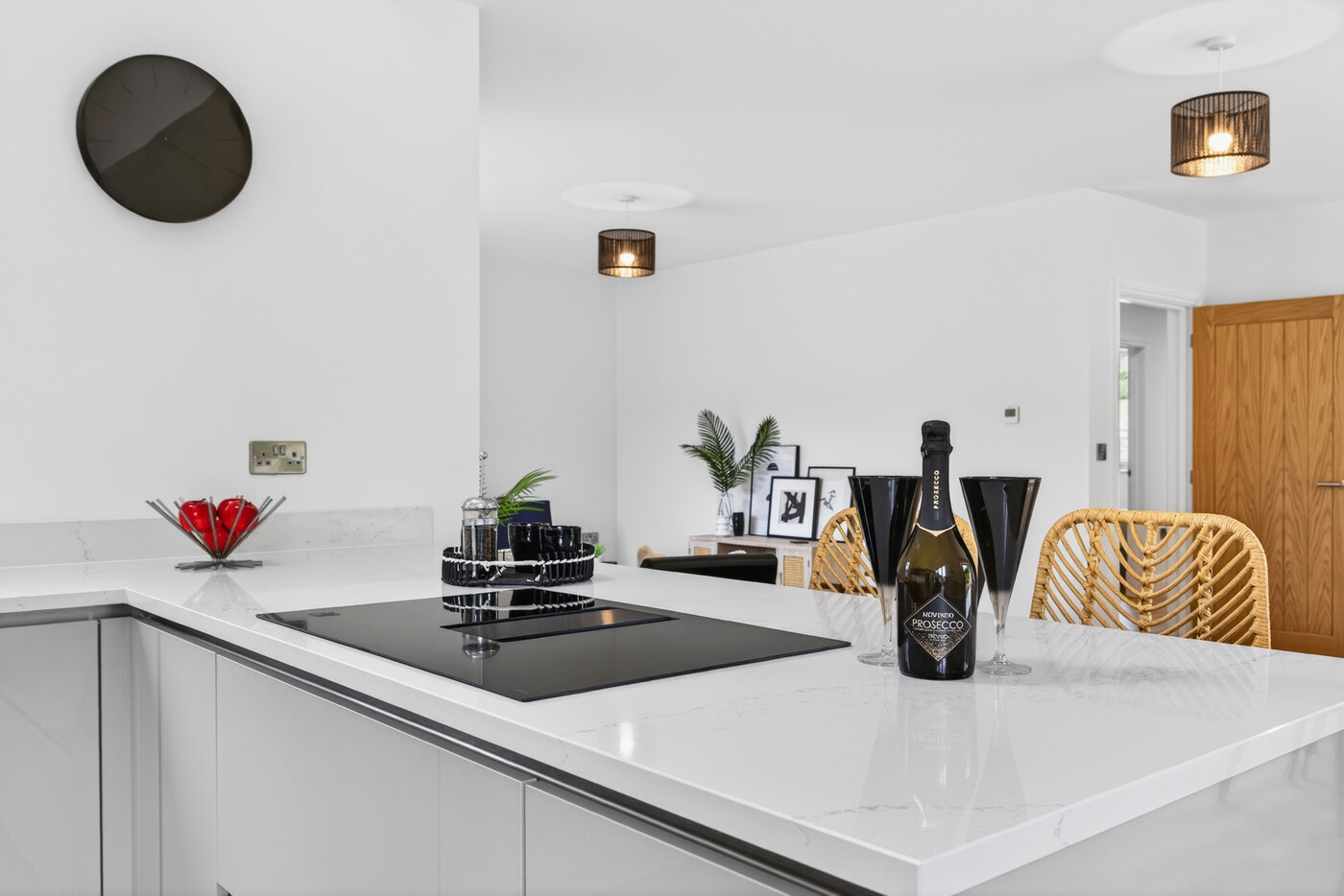 Silestone Quartz worktop detail with integrated Siemens hob and view through to the dining area.